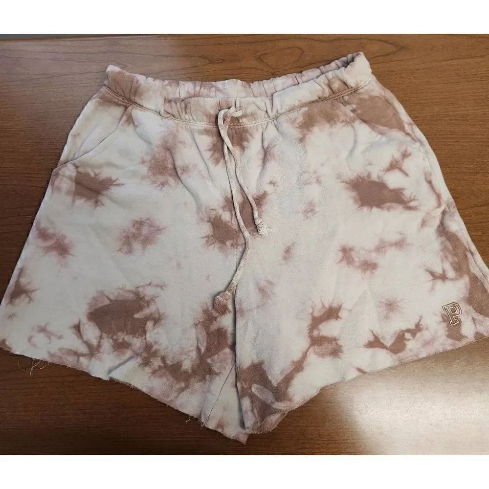 Pink Medium tie dye shorts redish/tan in color with pockets and tie waistband